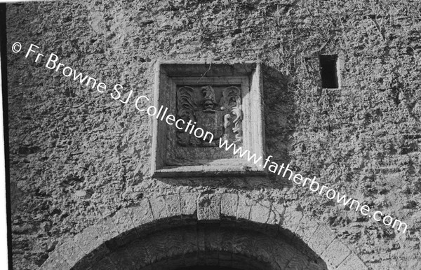 LISMORE CASTLE  ENTRANCE TO COURTYARD  ARMS ABOVE ARCH